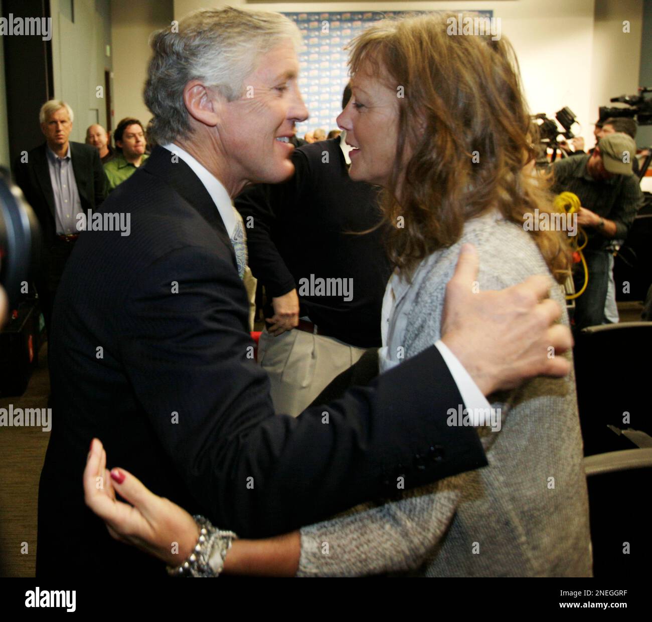 Former Southern California coach Pete Carroll, left, kisses his wife Glena  after he was introduced as the new head coach and executive vice president  of the Seattle Seahawks NFL football team at