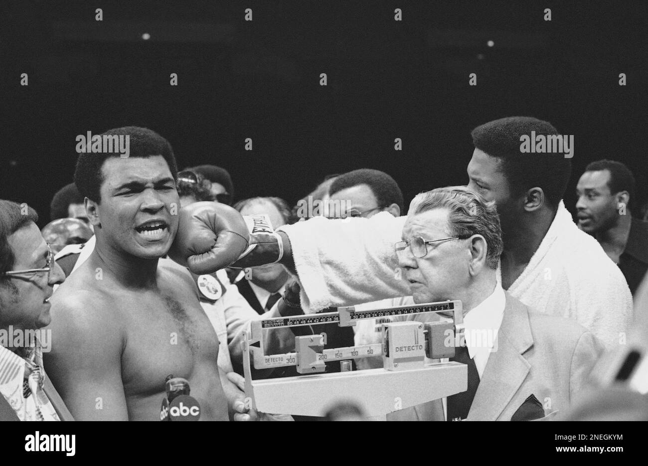 Heavyweight Champion Muhammad Ali, left, reacts as challenger Jimmy