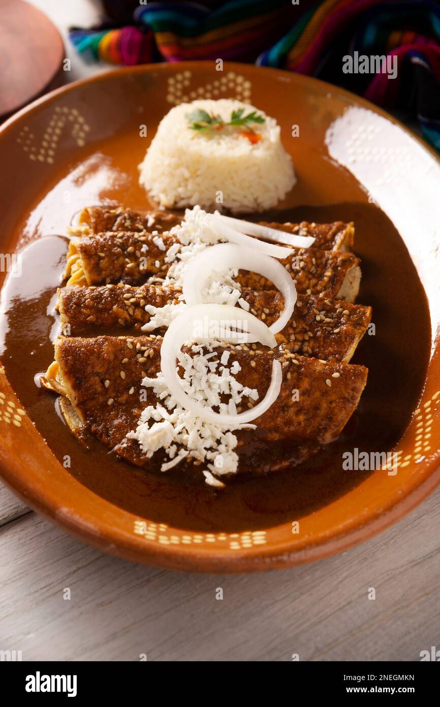 Chicken enmoladas. Also known as mole poblano enchiladas, they are a