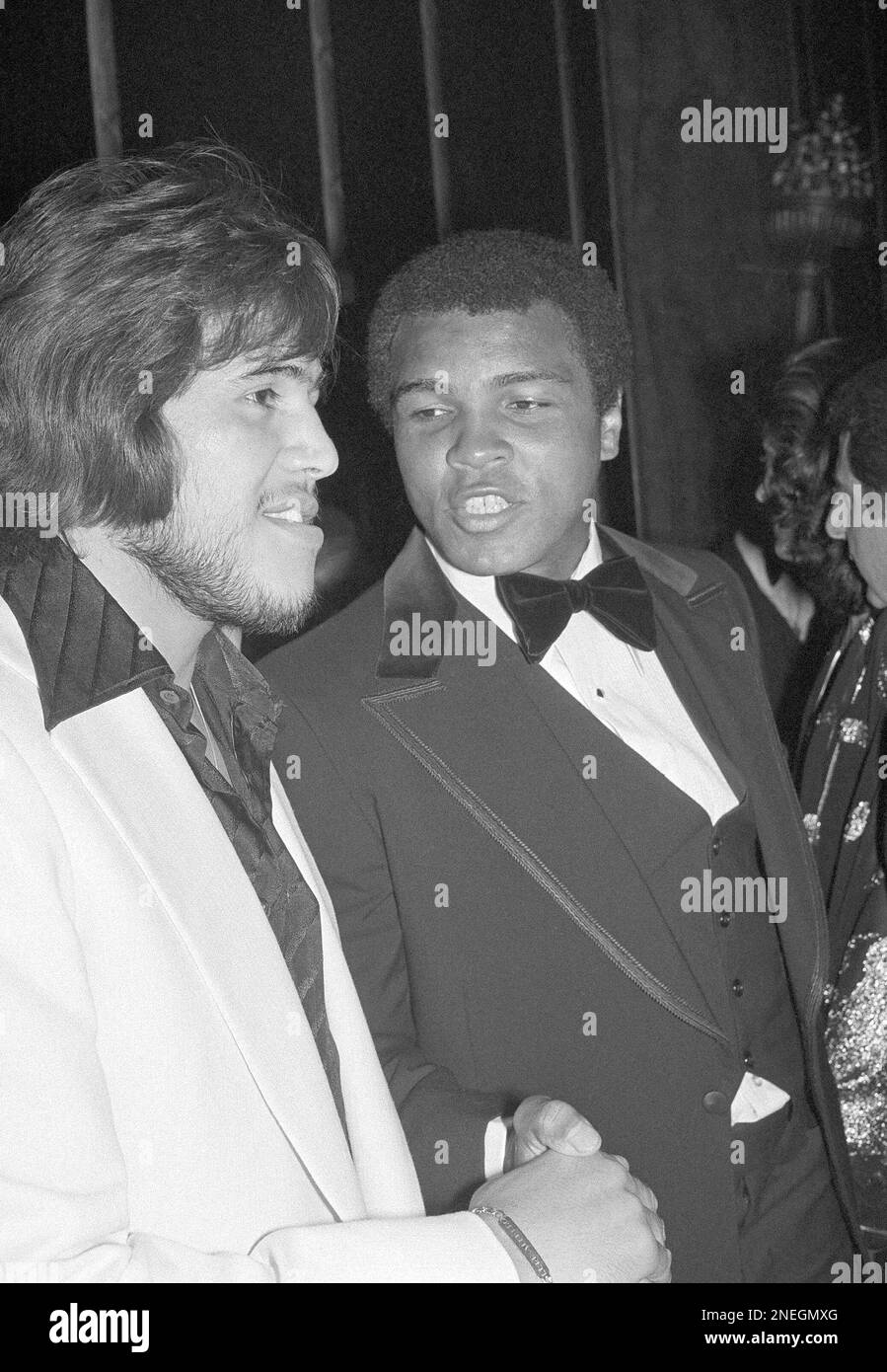 World heavyweight champion Muhammad Ali, right, speaks to European
