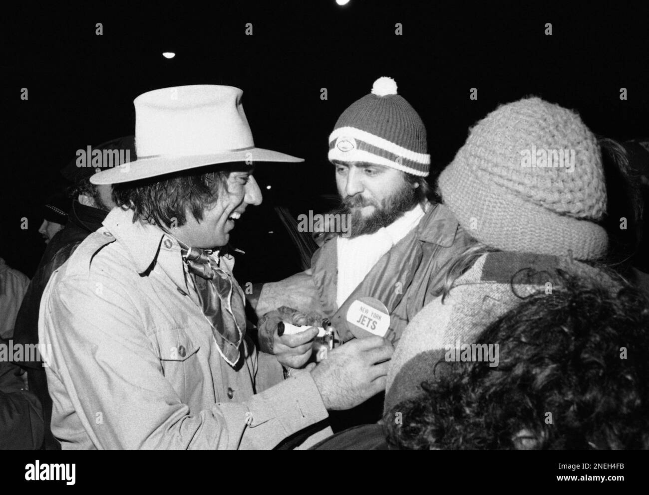 New York Jets quarterback Joe Namath, fresh from signing his new two-year  contract with the club, works out at the Jets training camp at Hofstra  University in Hempstead, New York, Thursday, August