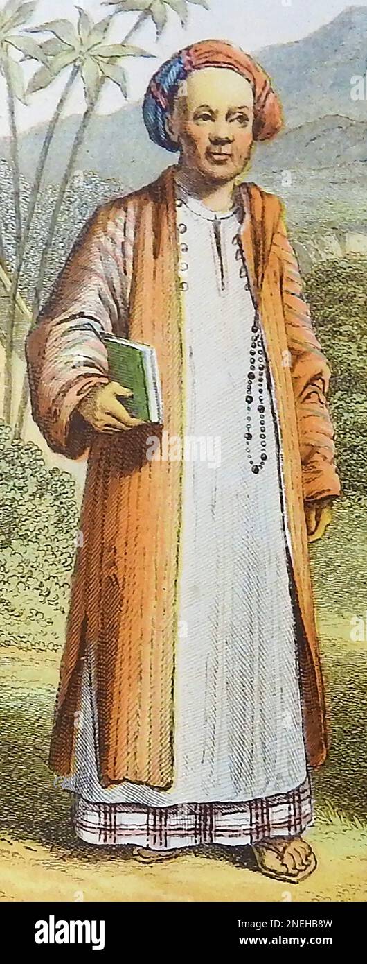 A late 19th century coloured engraving showing typical dress of the natives of Asian islands -  A priest from Java Stock Photo