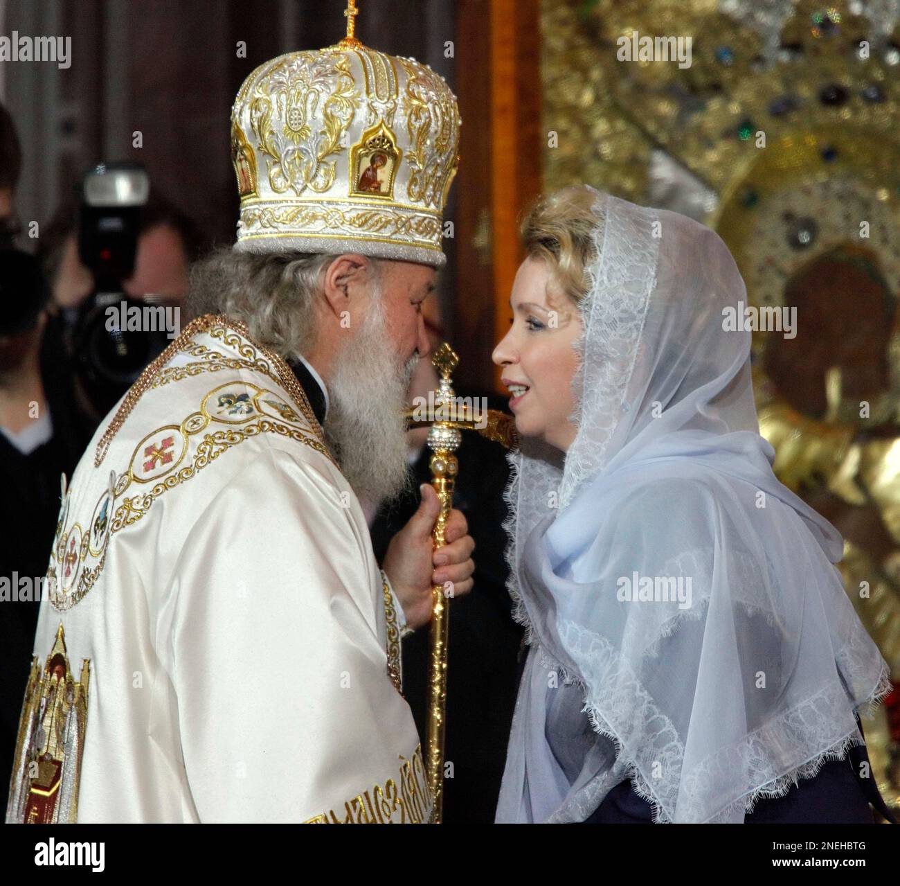 Russian Orthodox Church Patriarch Kirill, left, greets Russian