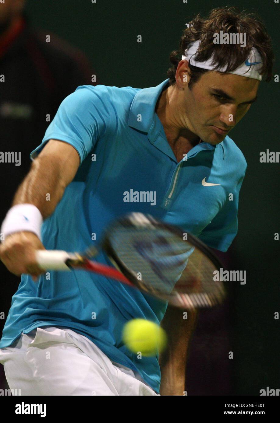 World number one tennis player Roger Federer, from Switzerland, returns the ball during his game