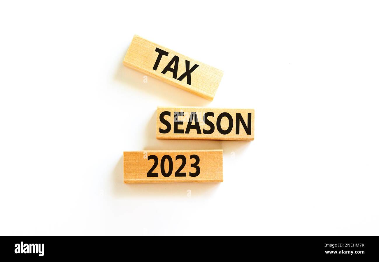 Tax season 2023 symbol. Concept words Tax season 2023 on wooden blocks