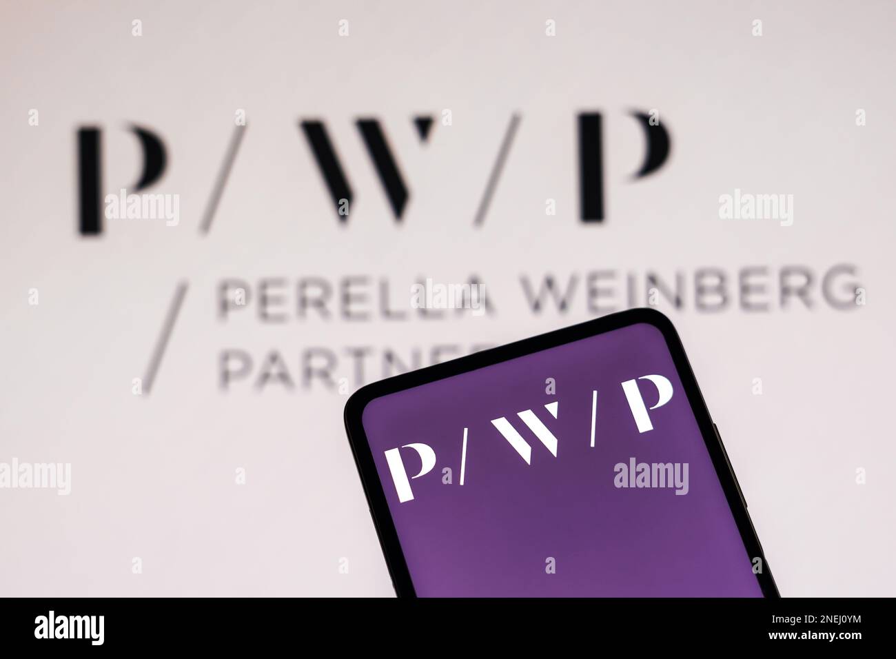 In this photo illustration the Perella Weinberg Partners (PWP) logo ...