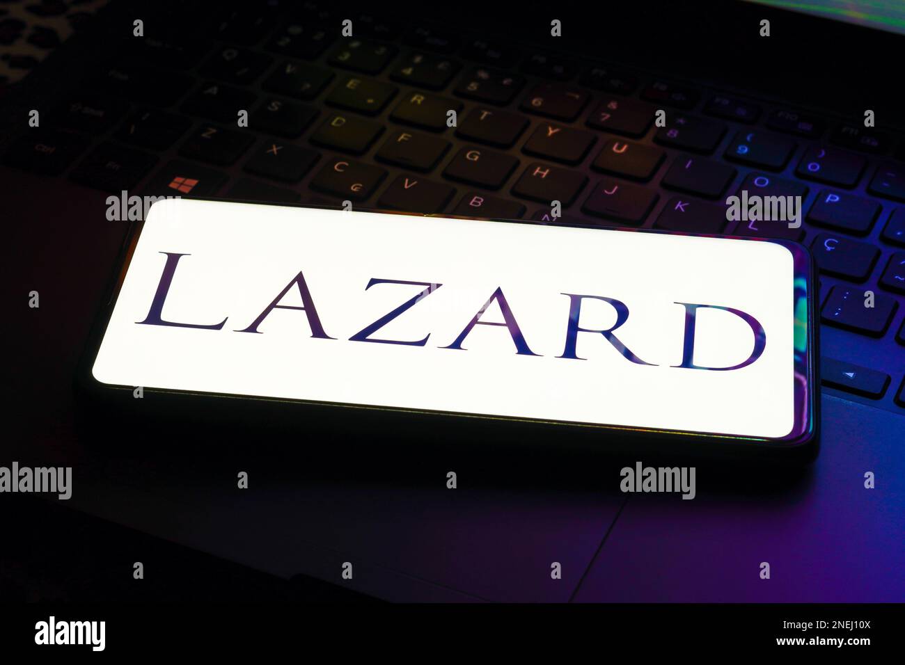 In this photo illustration the Lazard logo seen displayed on a
