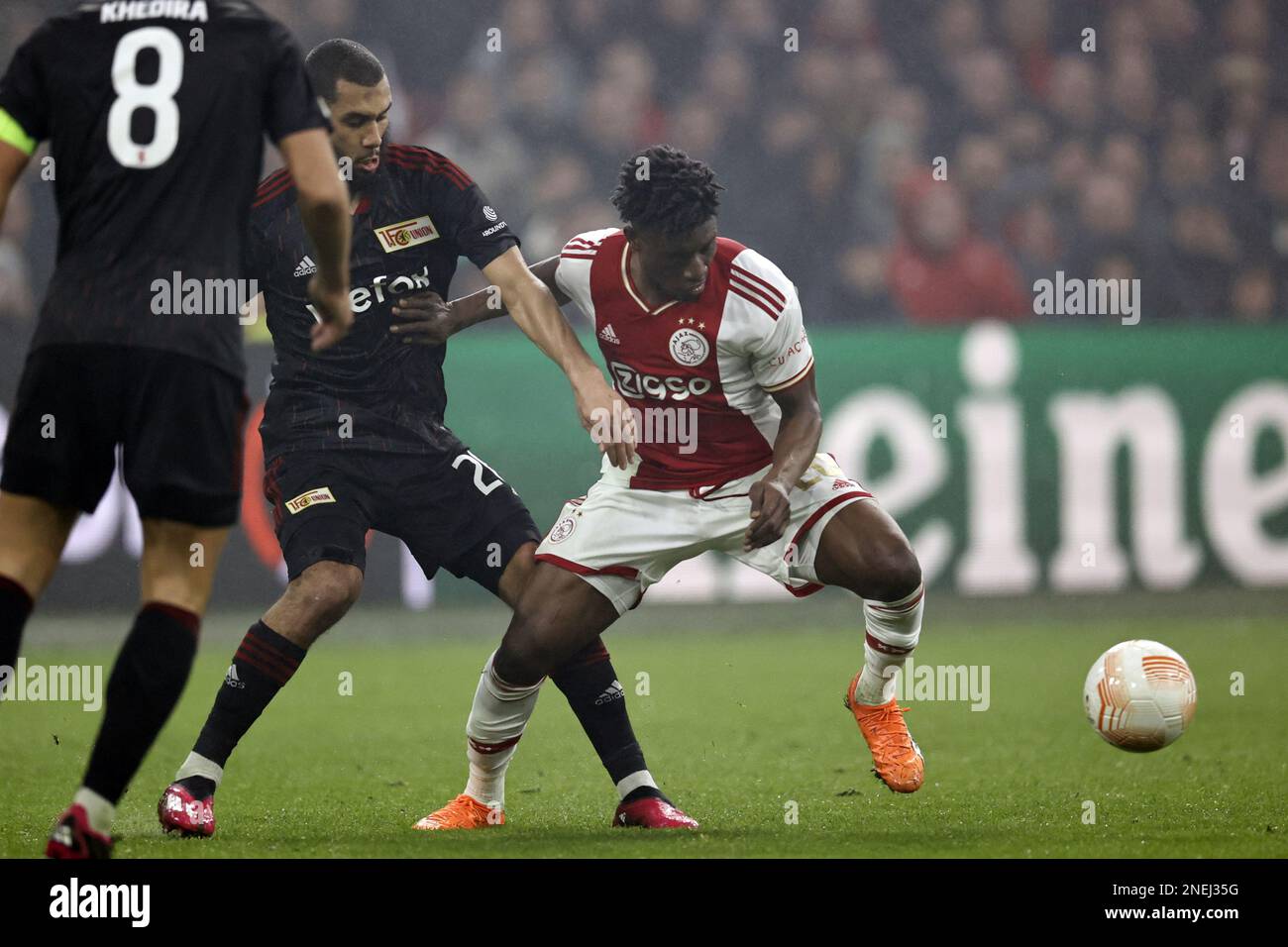 AMSTERDAM - (l-r) Aissa Laidouni of 1. FC Union Berlin, Mohammed Kudus of Ajax during the UEFA Europa league play-off match between Ajax Amsterdam and FC Union Berlin at Johan Cruijff ArenA on February 16, 2023 in Amsterdam, Netherlands. ANP MAURICE VAN STONE Stock Photo