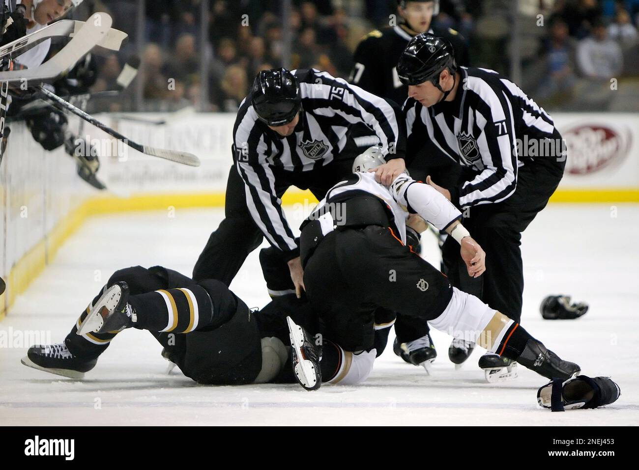 Dallas Stars center Brian Sutherby, bottom left,and Anaheim Ducks right wing Mike Brown, bottom right, fight in the first period of an NHL hockey game, Thursday, Dec. 31, 2009, in Dallas. (AP Photo/Brandon Wade) Stock Photo