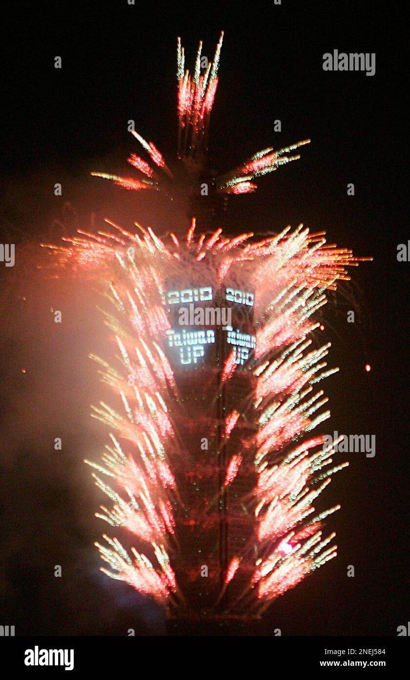 New Year fireworks light the Taipei cityscape from the tallest occupied