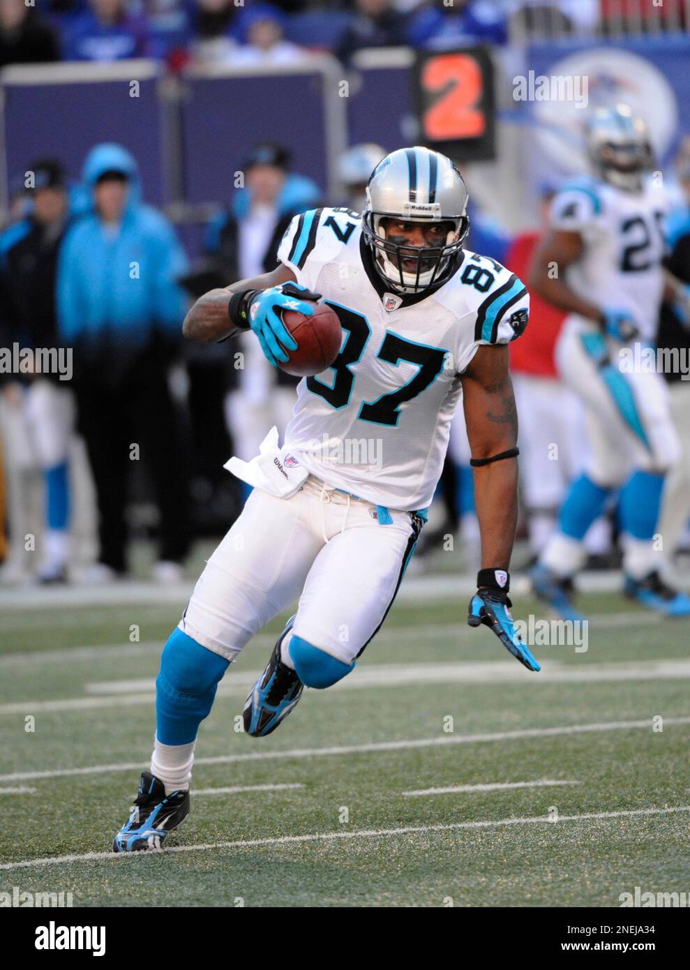 Carolina Panthers wide receiver Muhsin Muhammad watches a replay on the big  screen during the game against the Atlanta Falcons in Bank of America  Stadium on October 3, 2004. (UPI Photos/Bob Carey