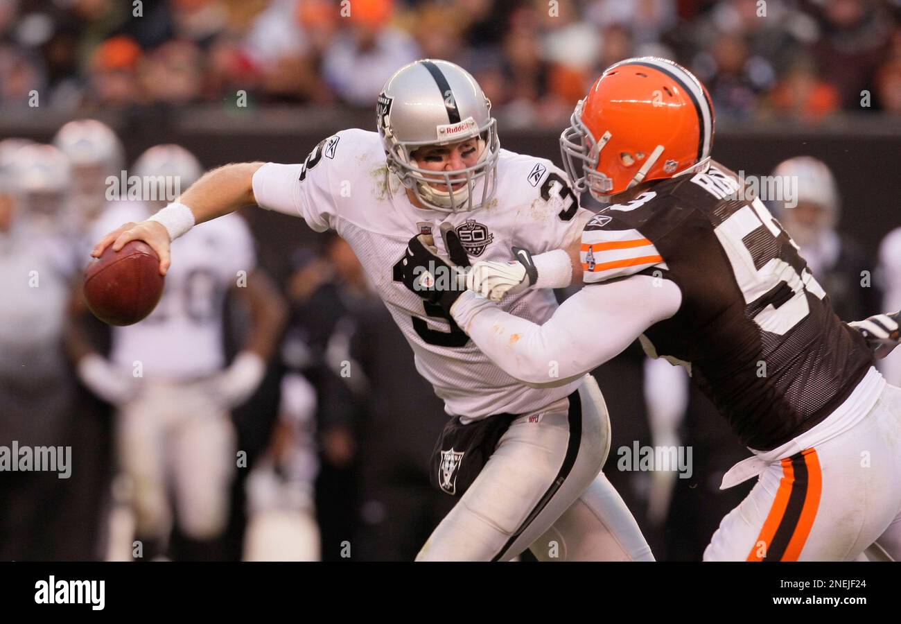 Oakland Raiders quarterback Charlie Frye (3) is sacked by