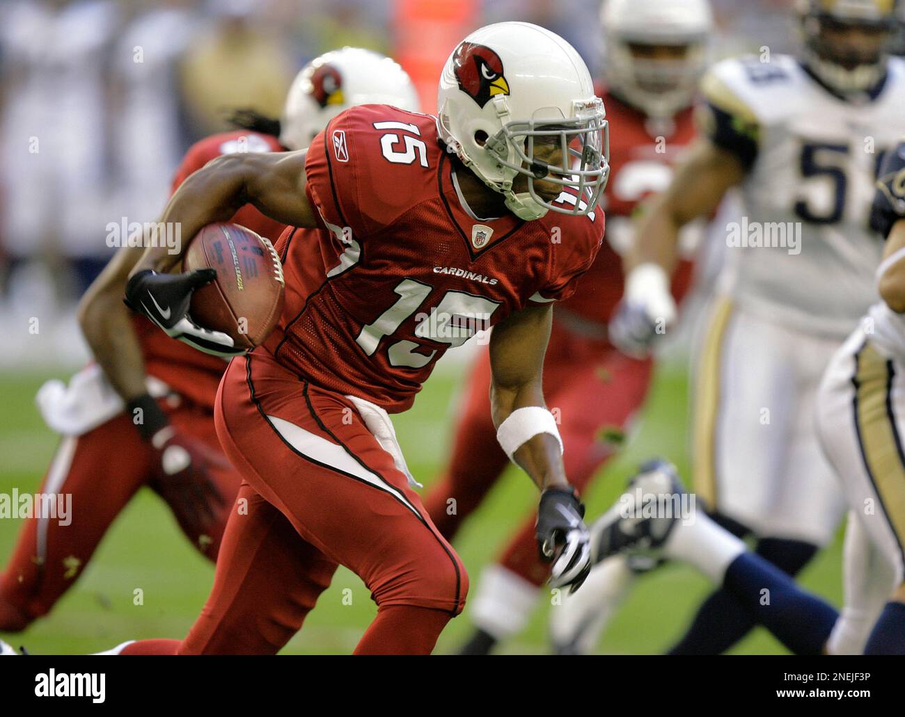 Arizona Cardinals wide receiver Steve Breaston (15) picks up yards ...