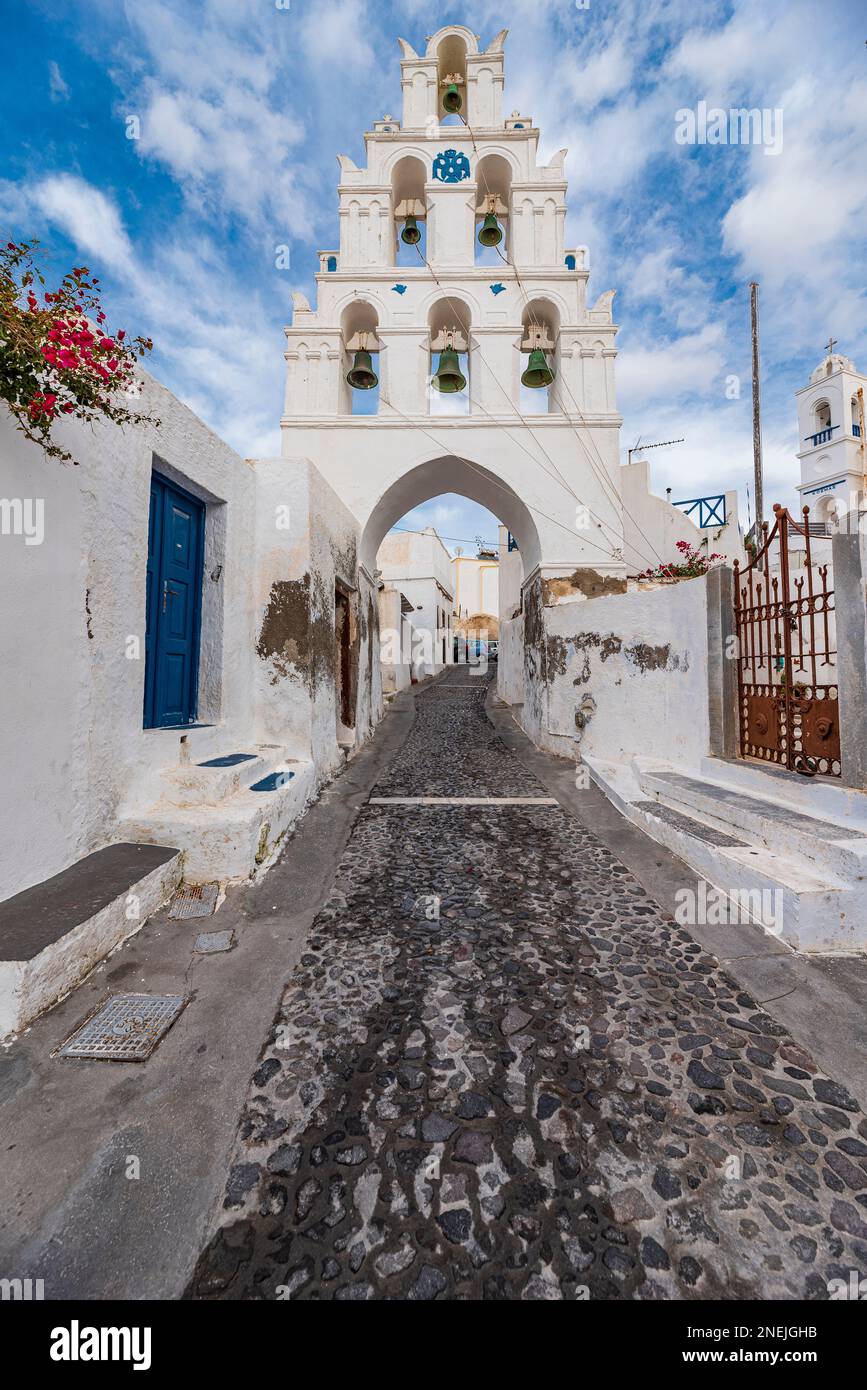 Characteristic arched passage under a bell tower in Megalochori village, Santorini Stock Photo