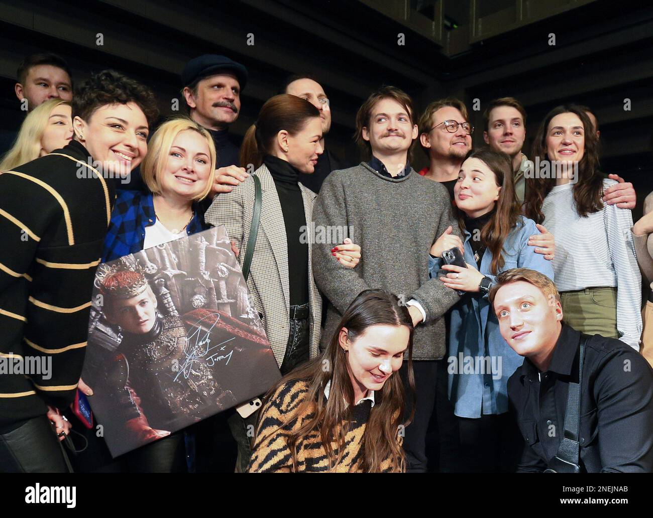 Kyiv, Ukraine 16 February 2023, Actor Jack Gleeson (C) poses for a photo during a meeting with Ukrainian actors at the Kyiv Academic Theater of Young Spectators in Kyiv, Ukraine 16 February 2023, amid Russia's invasion of Ukraine. Irish actor Jack Gleeson, best known for his role as King Joffrey Baratheon in the TV HBO series ''Game of Thrones'', came to Ukraine for several days to meet with fans and support the Ukrainian military, according to media. He along with his friends, brought a pickup truck, which was purchased by British volunteers for the Armed Forces of Ukraine, according to media Stock Photo