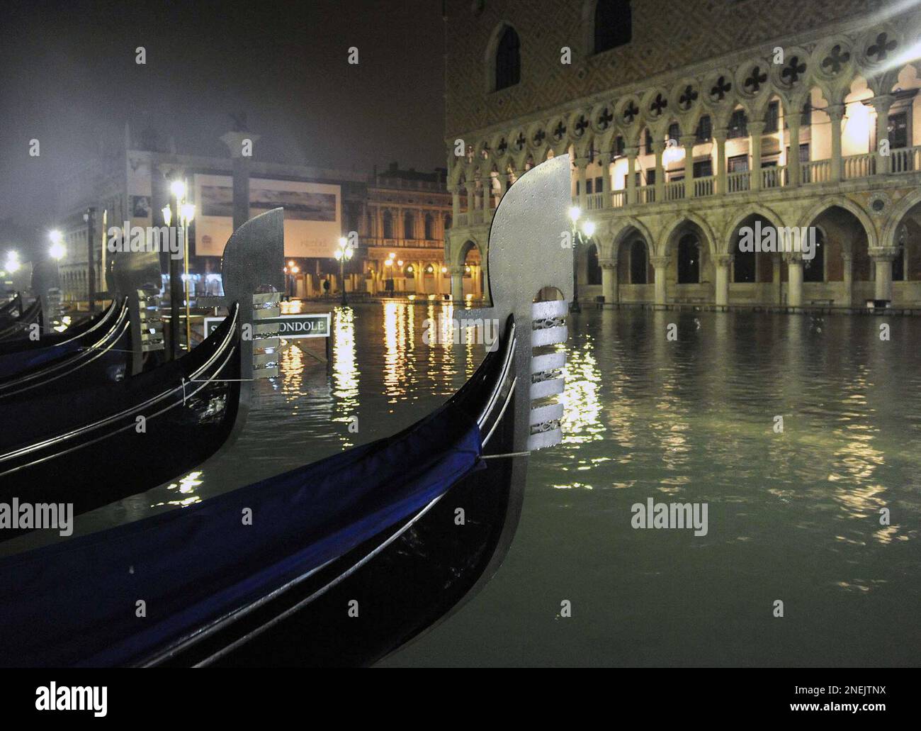 Gondolas are seen moored by a flooded St. Mark s Square after the high water reached a peak of 144 cm 4.70 feet the highest level of 2009 in Venice Italy early Wednesday