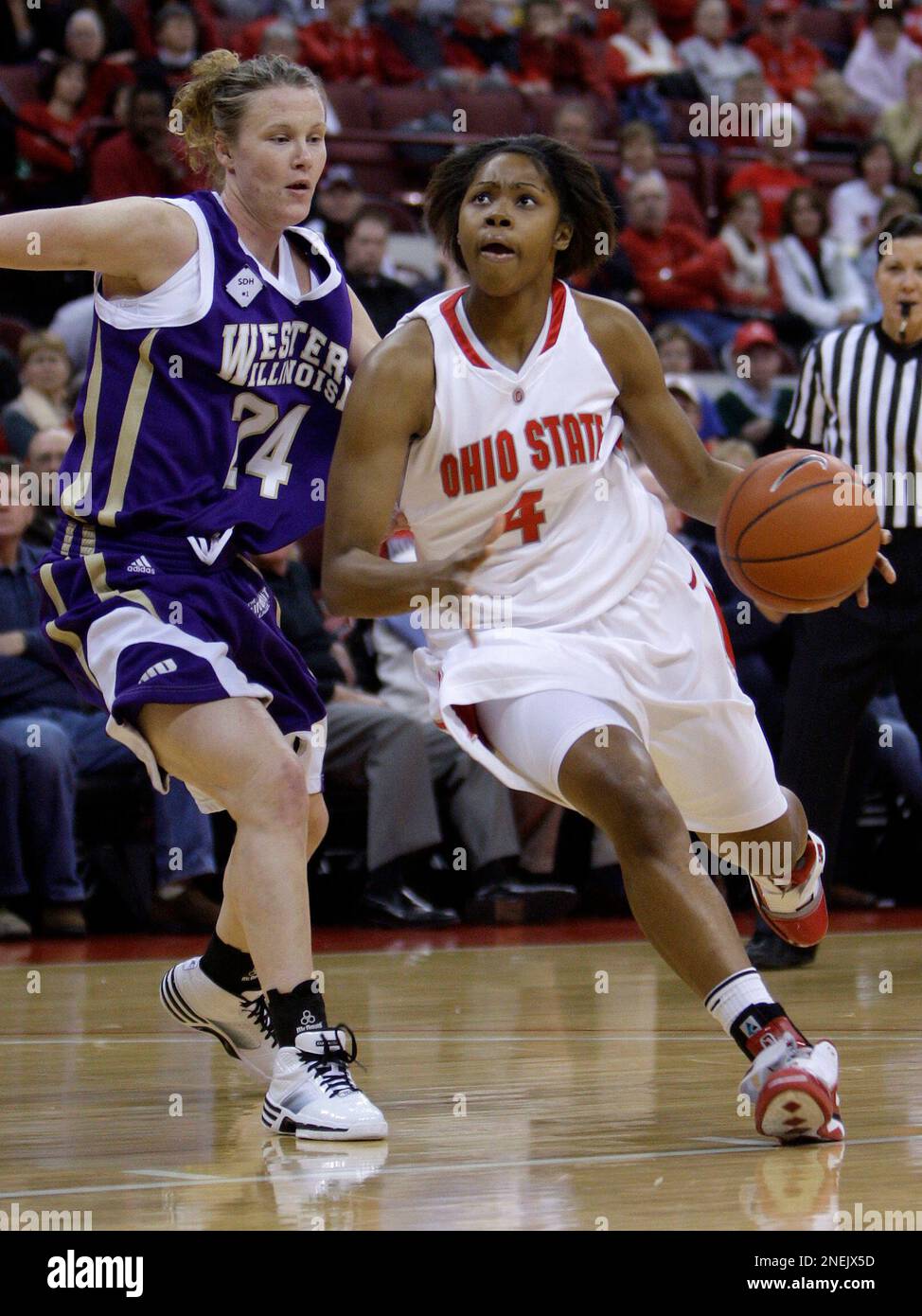 Ohio State's Tayler Hill, right, drives to the basket against Western ...