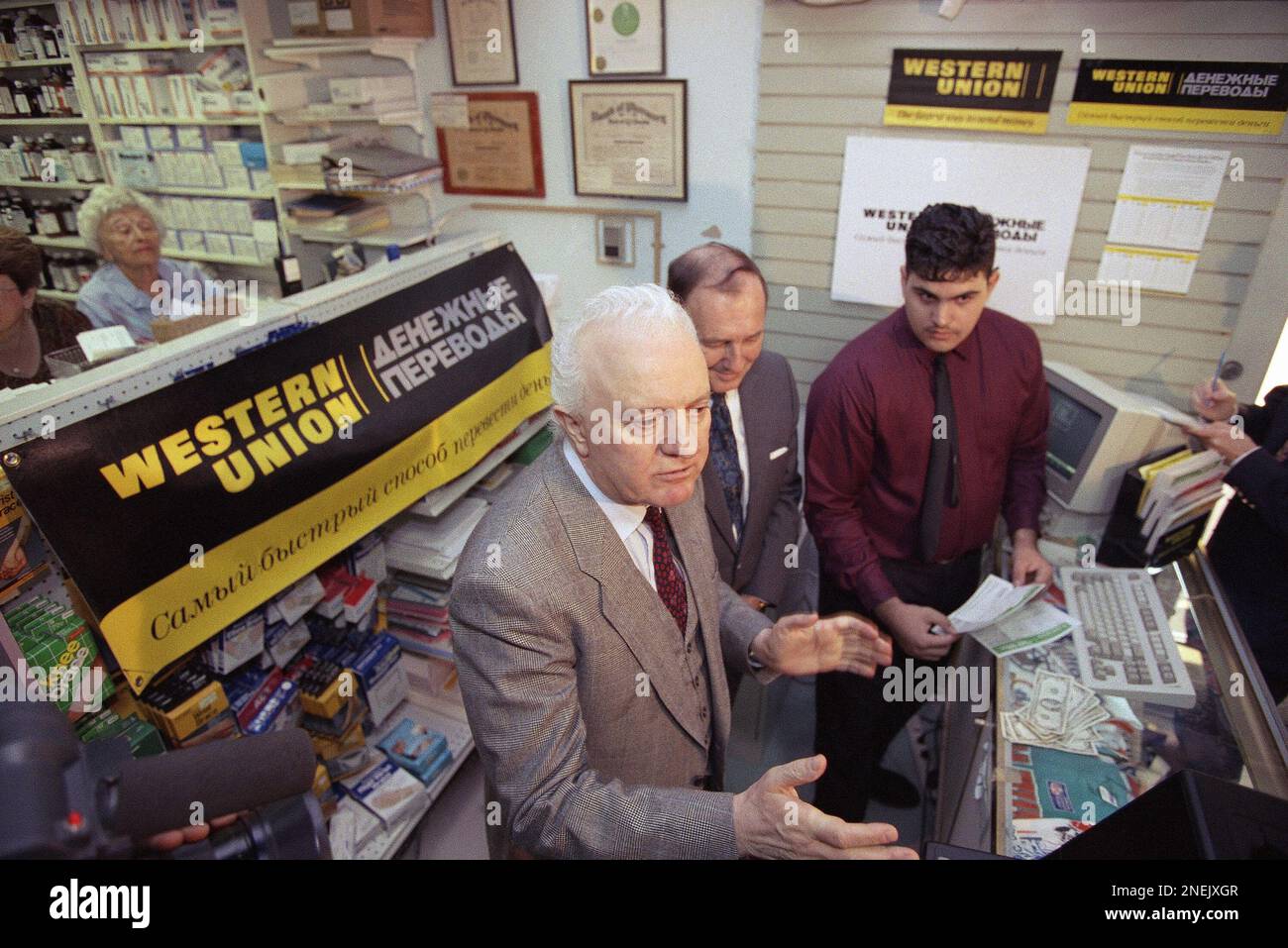 Former Soviet Foreign Minister Eduard Shevardnadze, left, inaugurates Western  Union?s money transfer service between the U.S. and Russia in Miami Beach,  Florida on Friday, Feb. 28, 1992. With the aid of Western