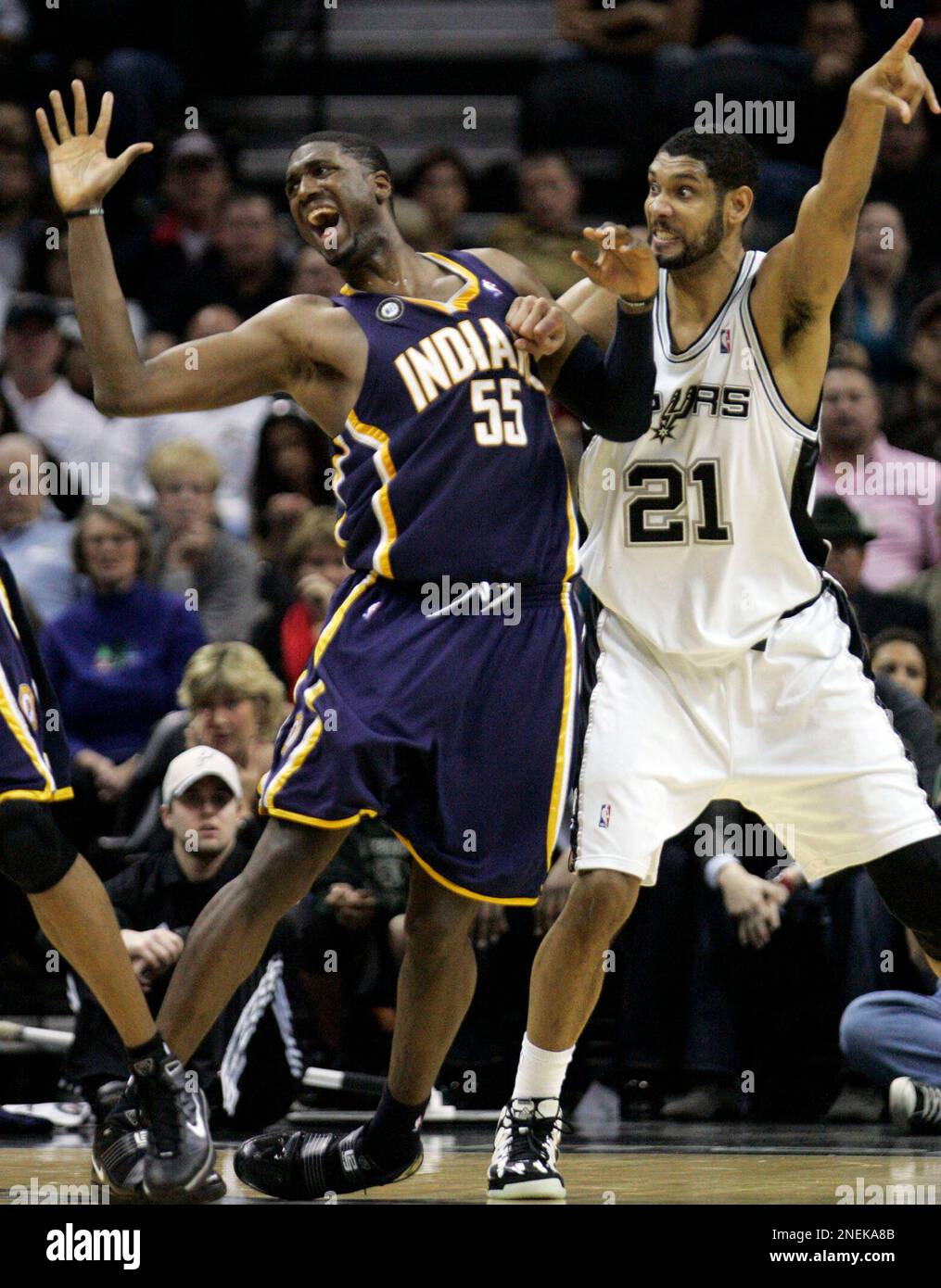 Indiana Hibbert and San Antonio Spurs' Tim Duncan for position during the second half of an NBA basketball game in San Saturday, Dec. 19, 2009. (AP Photo/Delcia Lopez