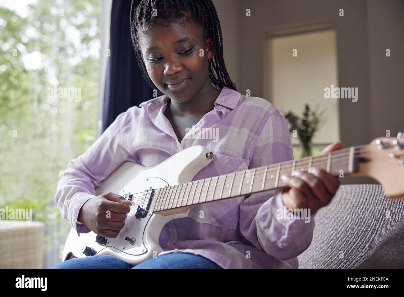 Guitar lesson girl hi-res stock photography and images - Alamy