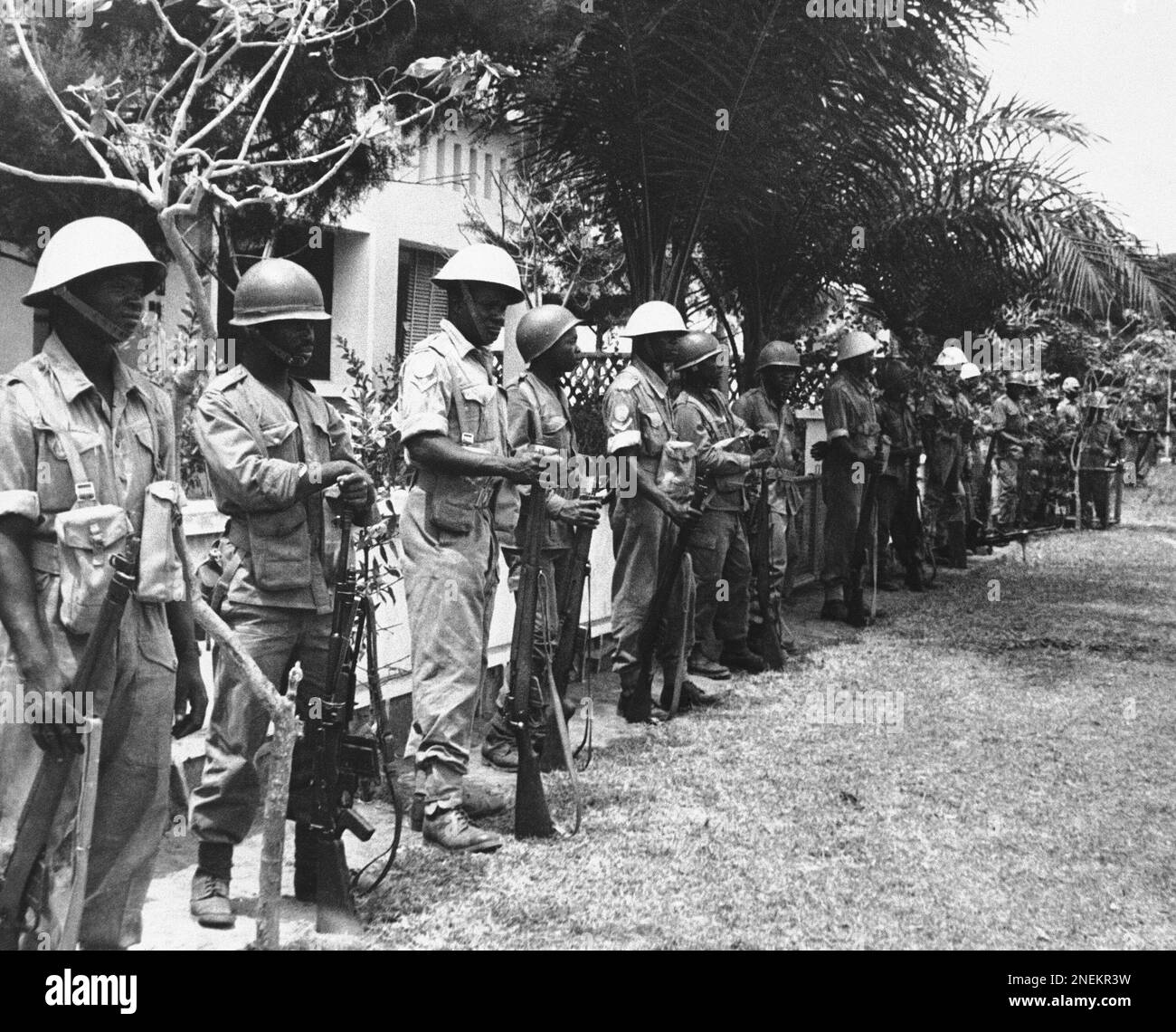 Congolese and Ghanian U.N. troops alternate along the drive to the ...