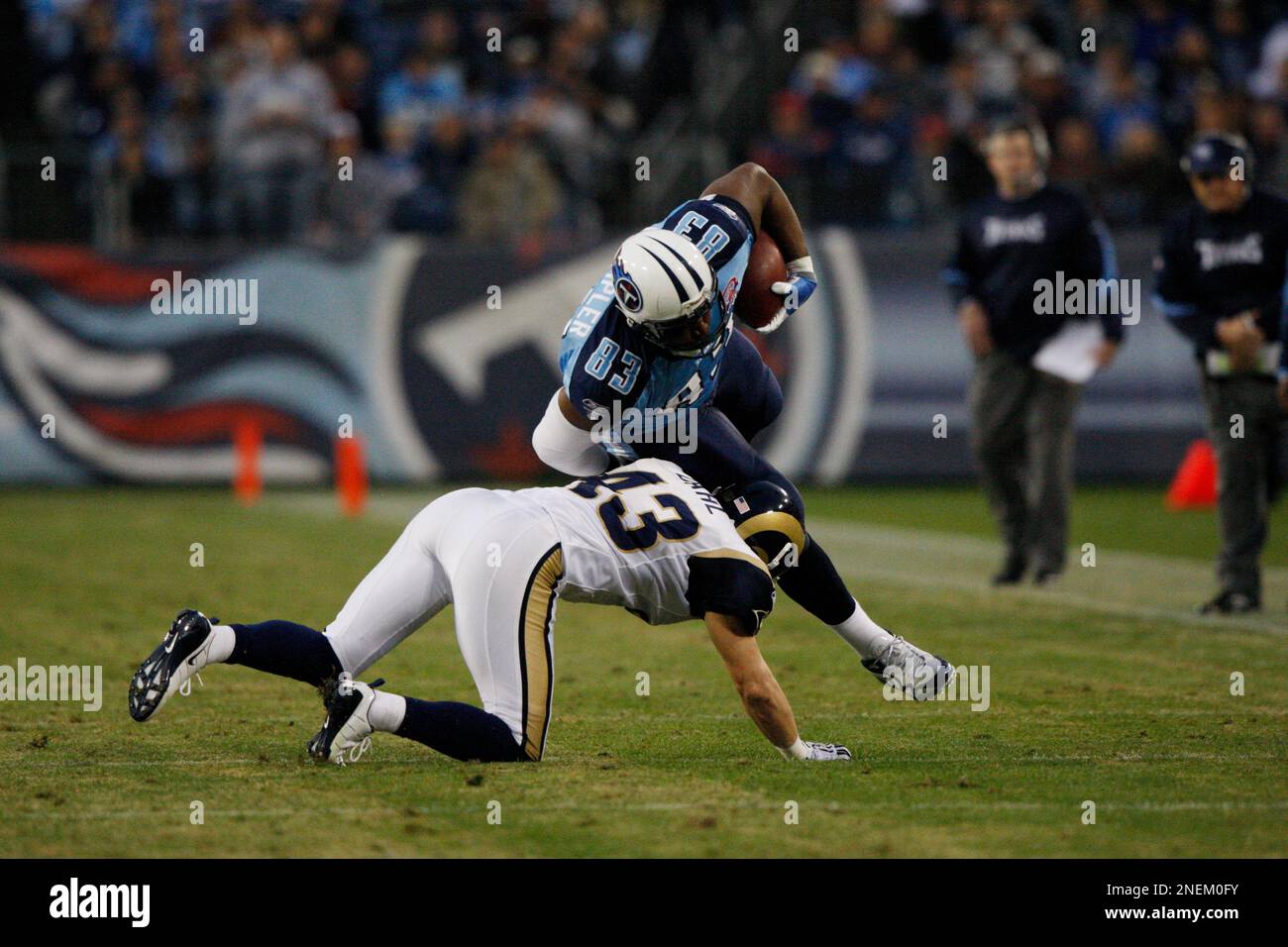 Tennessee Titans tight end Alge Crumpler (83) is tackled by St. Louis ...