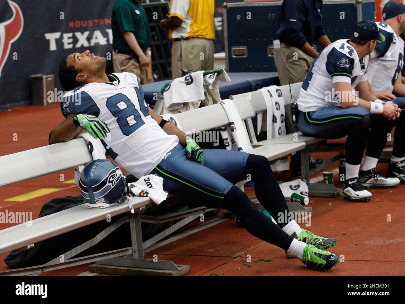 Seattle Seahawks' T.J. Houshmandzadeh sits on the bench late in the fourth  quarter of an NFL football game against the Chicago Bears, Sunday, Sept.  27, 2009, in Seattle. The Bears beat the