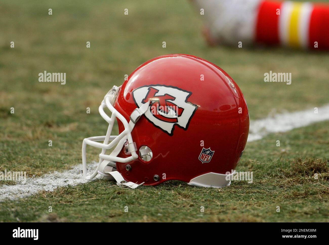 A Kansas City Chiefs helmet sits on the sideline during the game