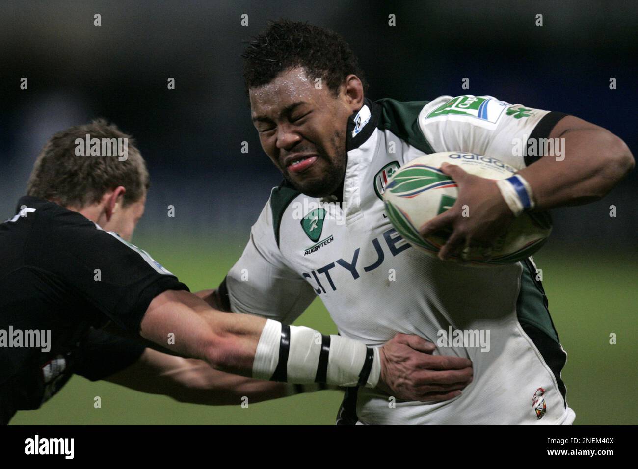 London Irish's Steffon Armitage, right, powers his way through the ...