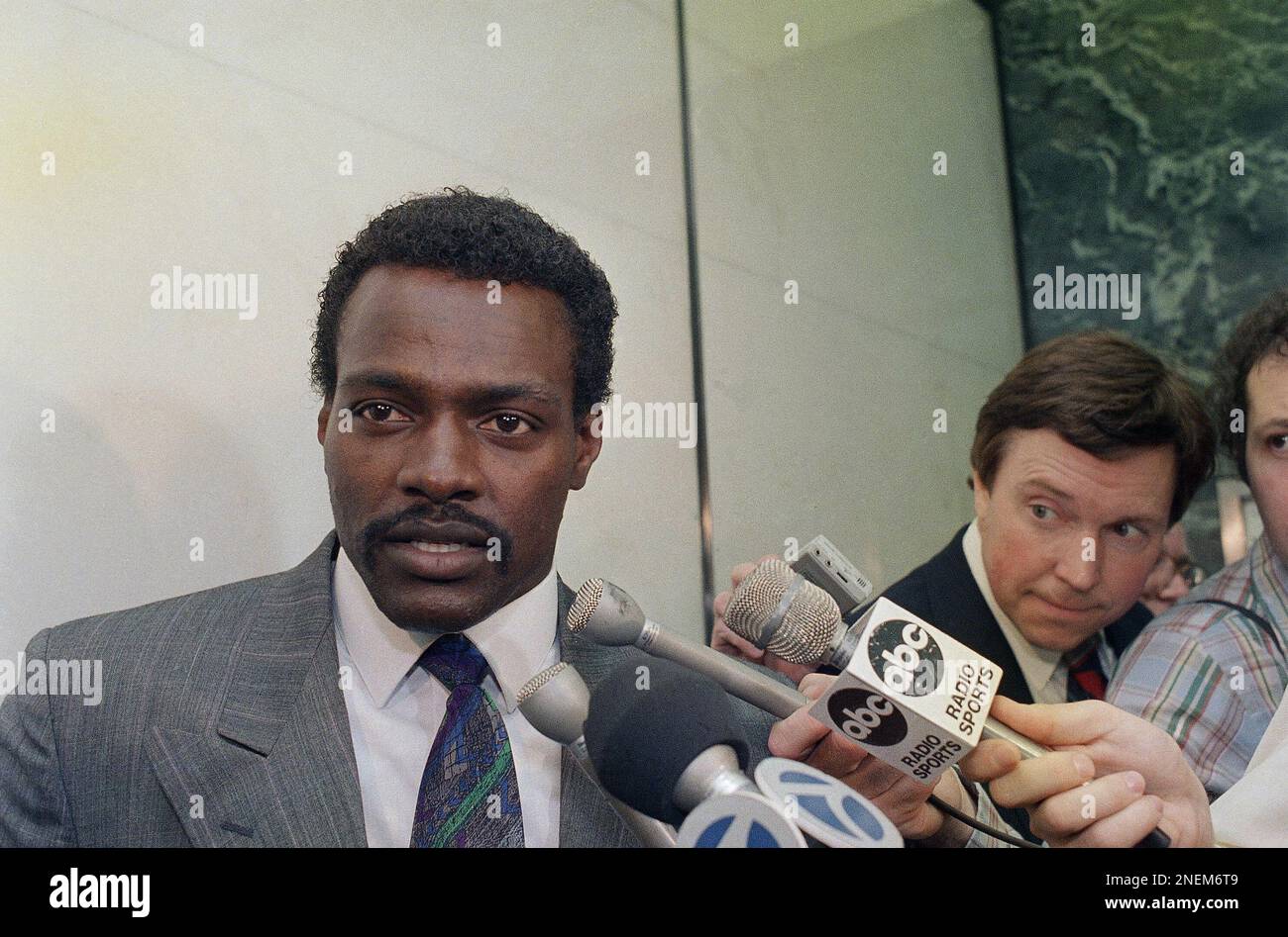 Walter Payton talk to reporters in New York on Friday, May 15, 1987