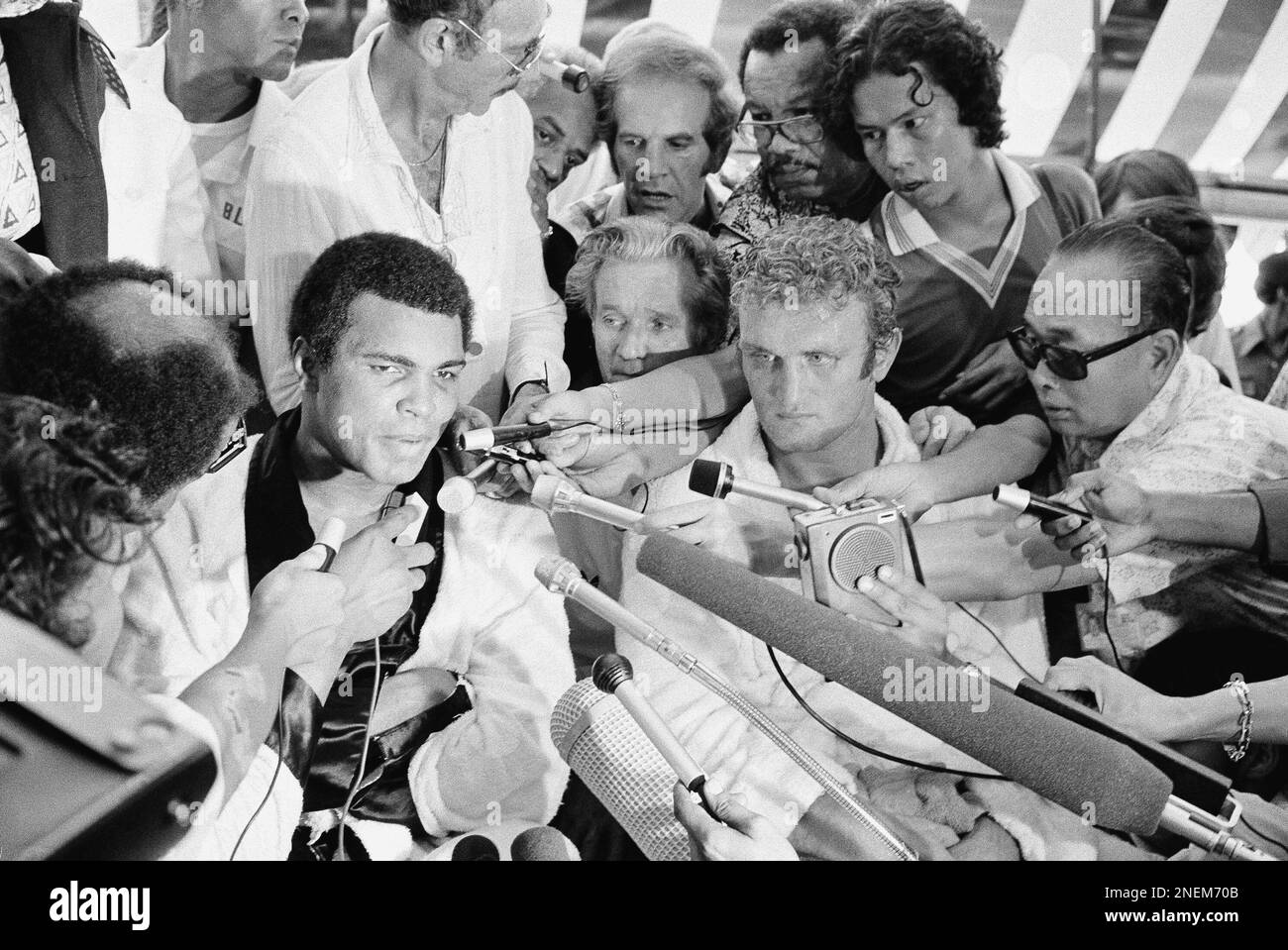 Muhammad Ali, who retained his world heavyweight title, at news