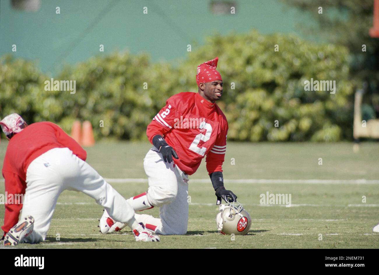 San Francisco 49ers cornerback Deion Sanders goes through stretching exercises prior to a team