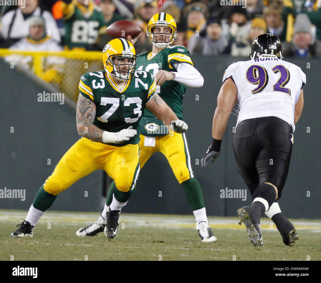 Green Bay Packers' Daryn Colledge(73) protects quarterback Aaron