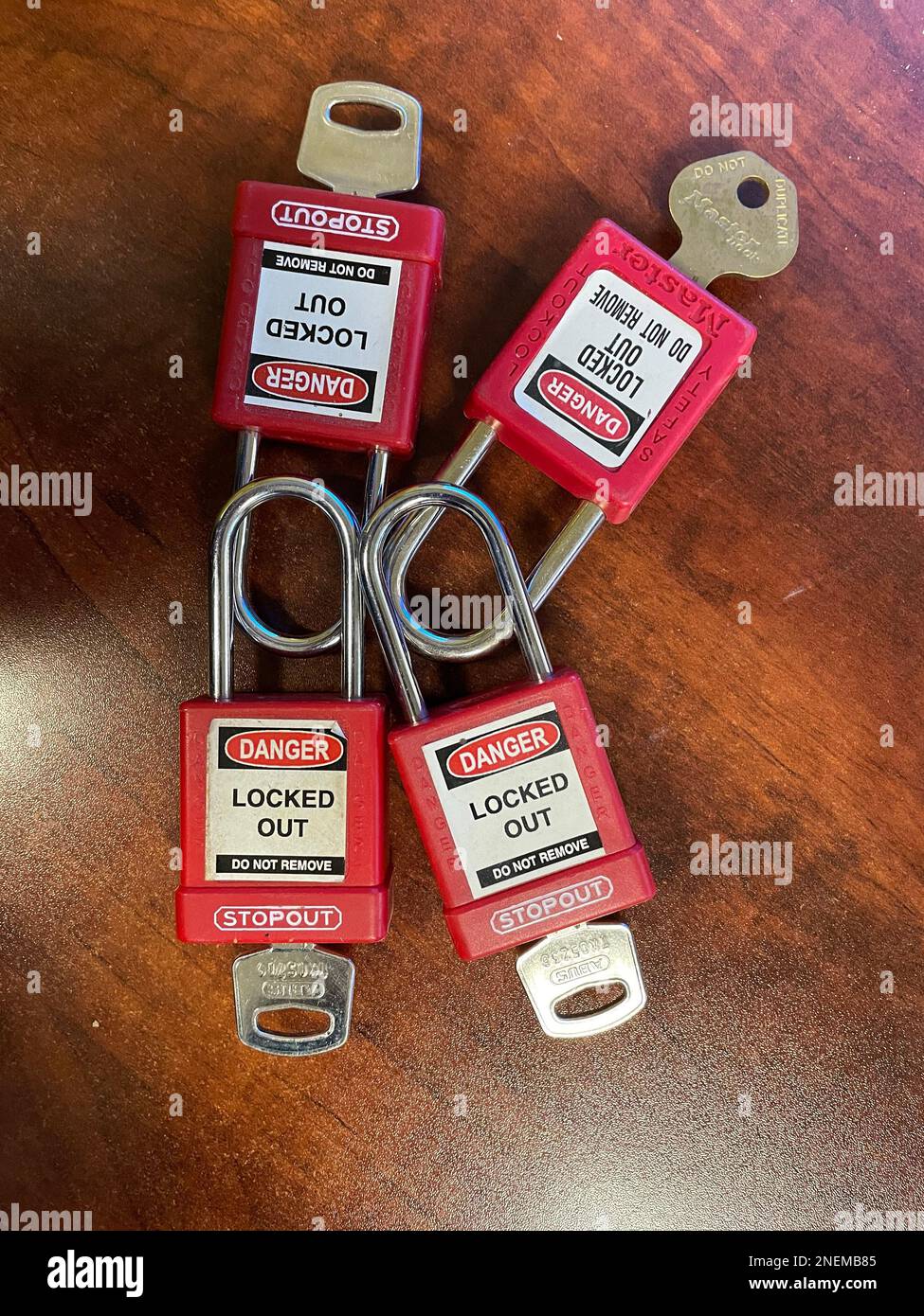 Red Lock out tag out locks locks . High quality photo Stock Photo Alamy