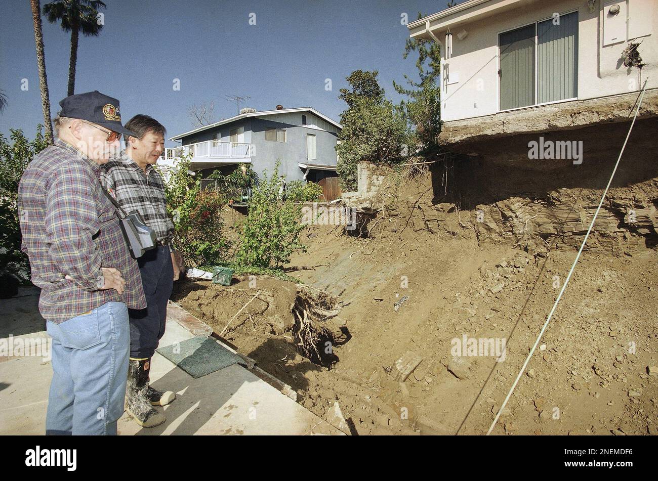 Los Angeles County building safety inspectors, Gary Solem, left, and