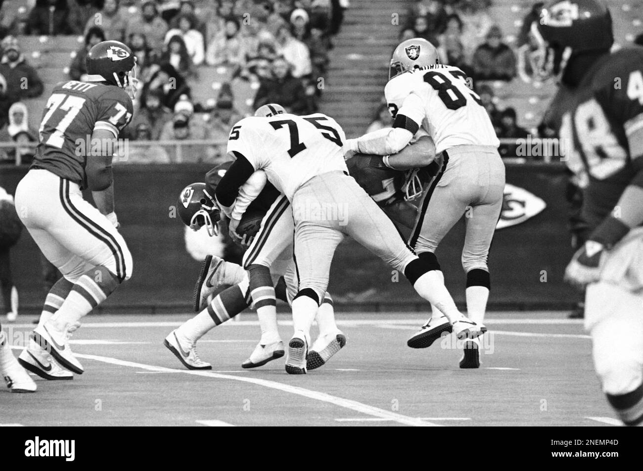 Los Angeles Raiders defensive end Howie Long (75) comes down on Kansas City  Chiefs quarterback Steve Fuller and rides him down for the sack in the  second quarter of game on Sunday