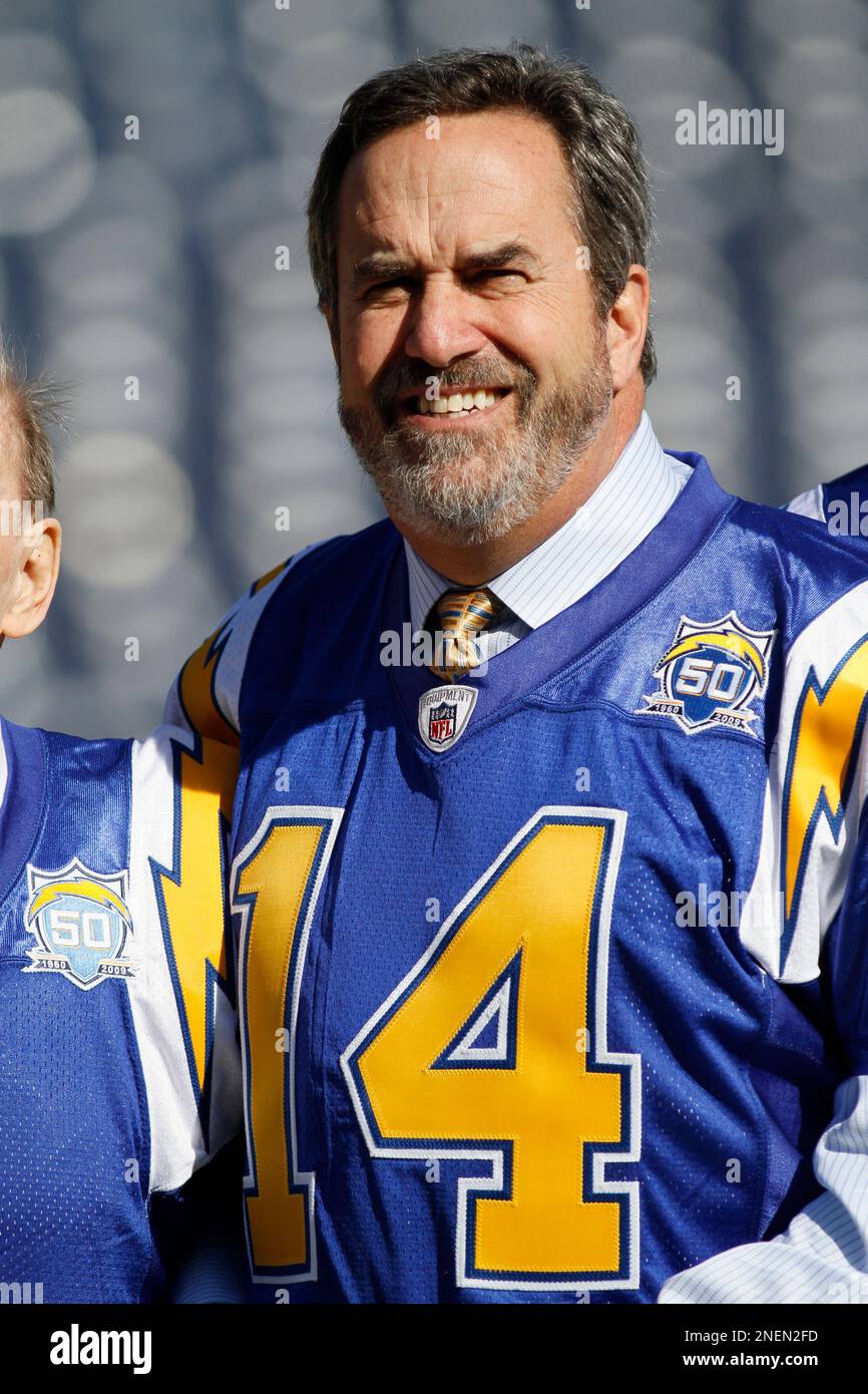 Former San Diego Chargers quarterback Dan Fouts watches during