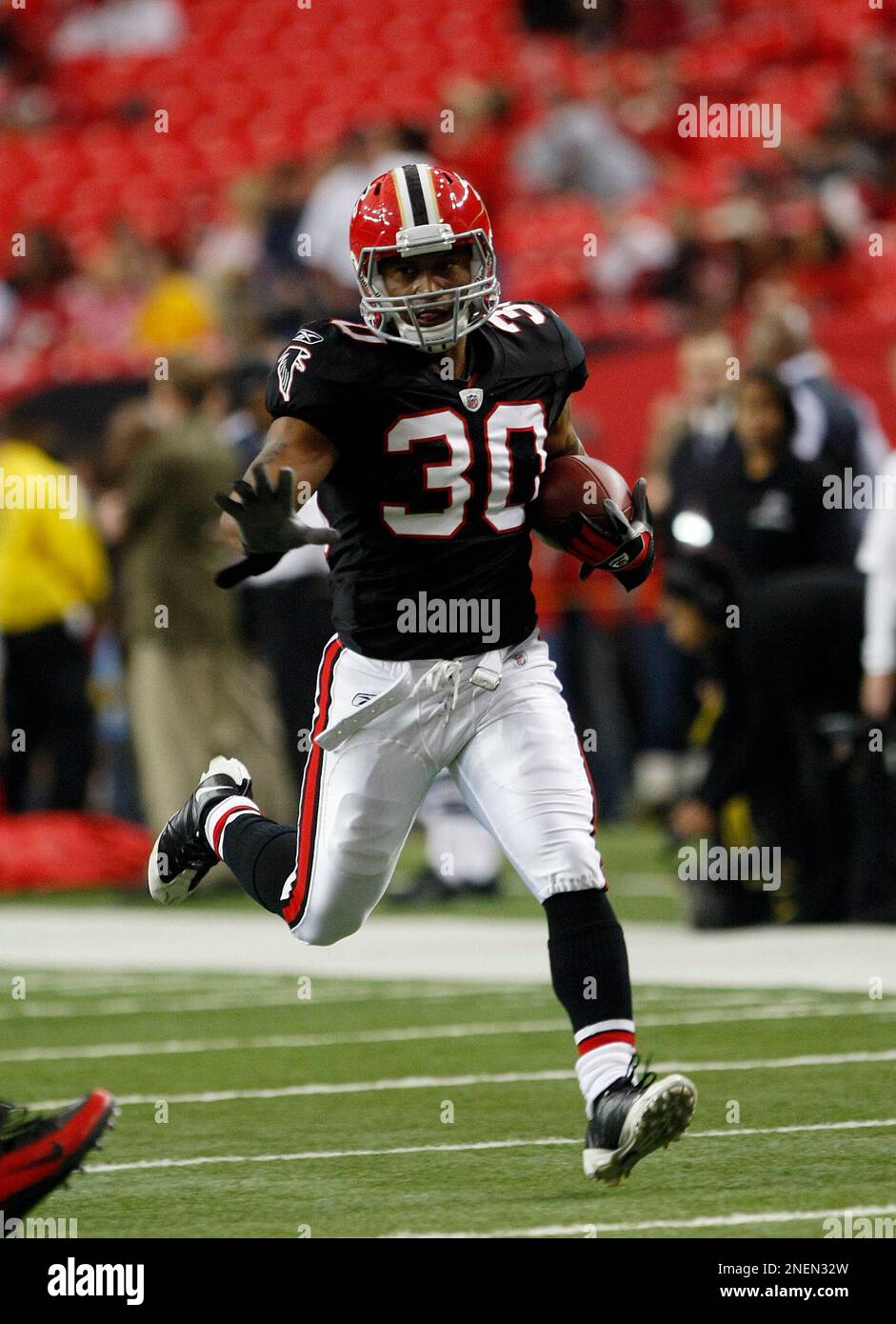 Atlanta Falcons running back Aaron Stecker (30) prepares for their NFL  football game against the Tampa Bay Buccaneers at the Georgia Dome in  Atlanta Sunday, Nov. 29, 2009, (AP Photo/Dave Martin Stock