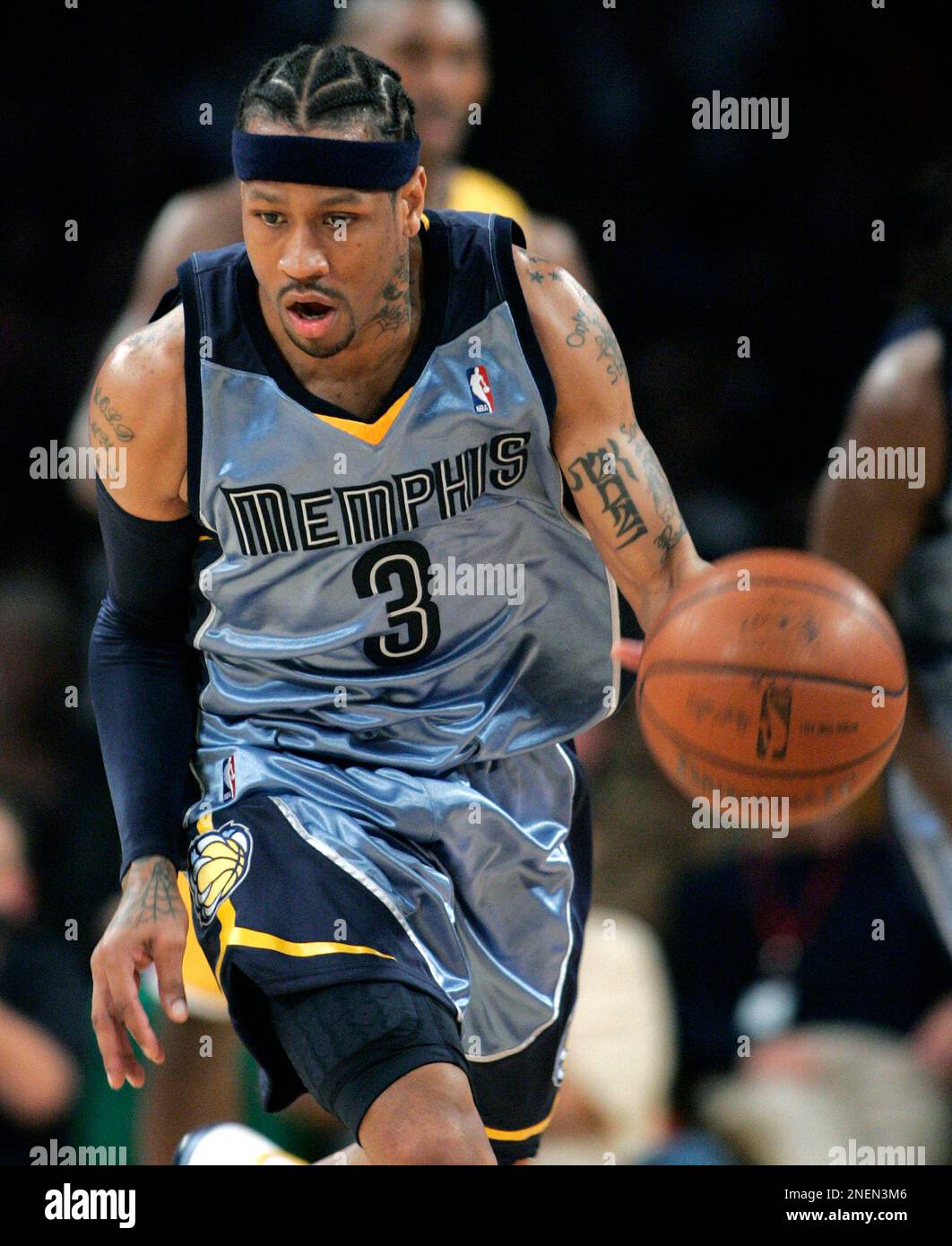 Memphis Grizzlies guard Allen Iverson brings the ball up court against ...