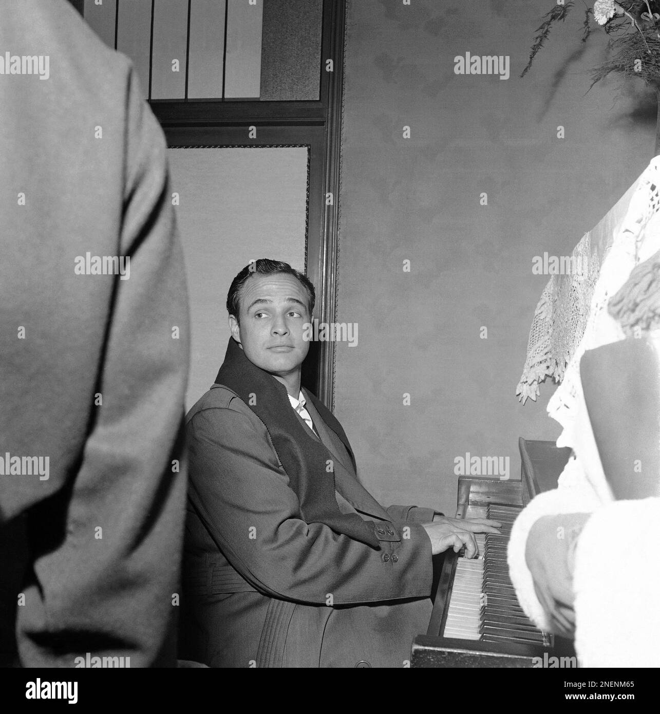 Marlon Brando Plays The Piano As The Cast Of Sayonara Waits In The marlon-brando-plays-the-piano-as-the-cast-of-sayonara-waits-in-the