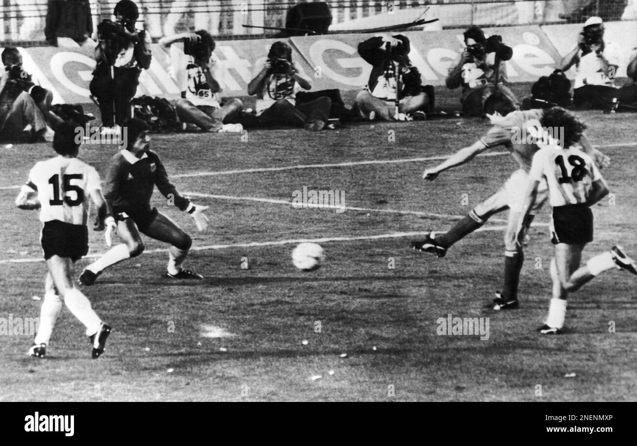 Belgium's Erwin Vandenbergh, second right, scores a goal for his team  during the Football World Cup match between Belgium and Argentina in  Barcelona, Spain on June 13, 1982. Argentine players left to