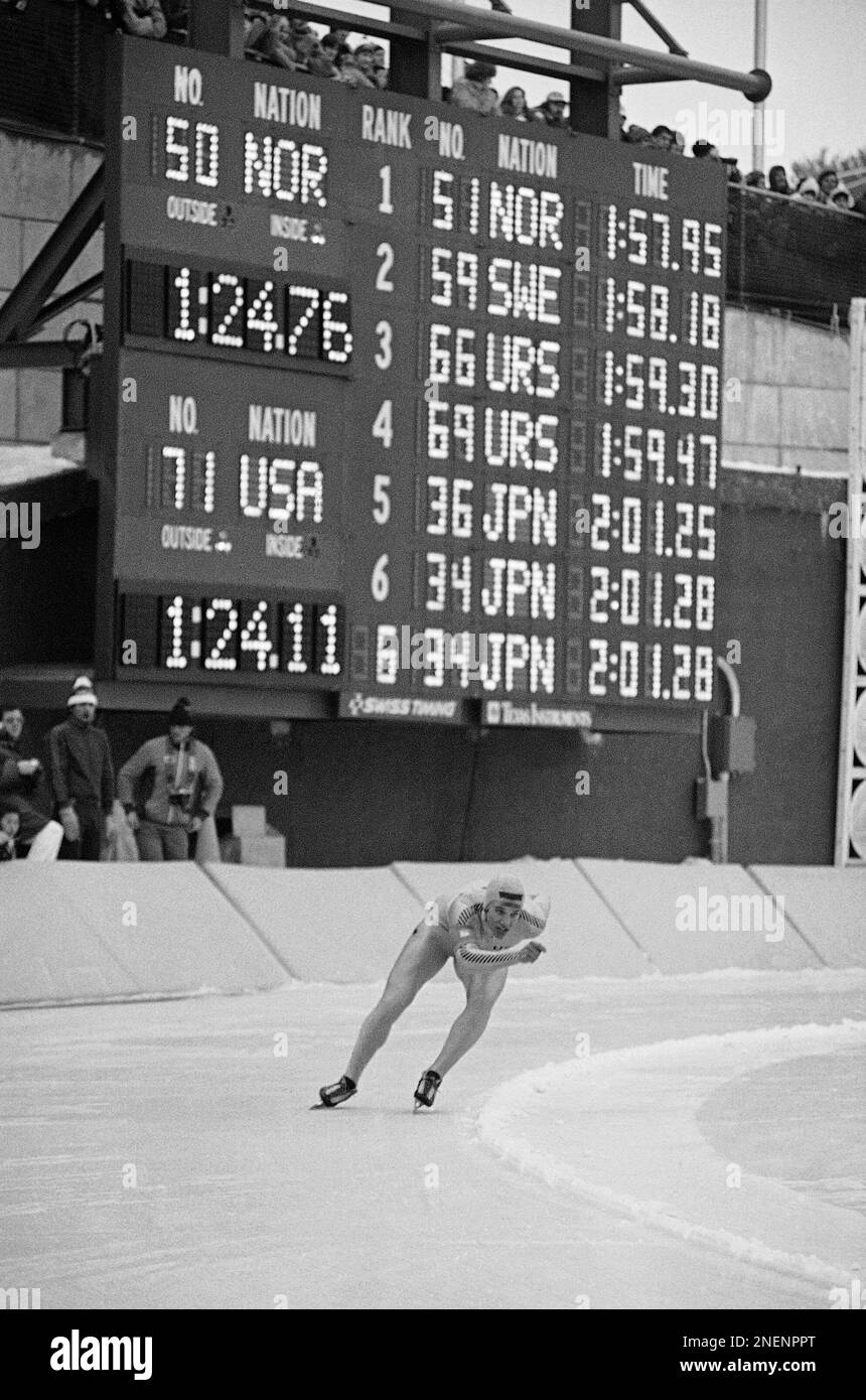 Eric Heiden, of Madison, Wis. seen racing past the times result board