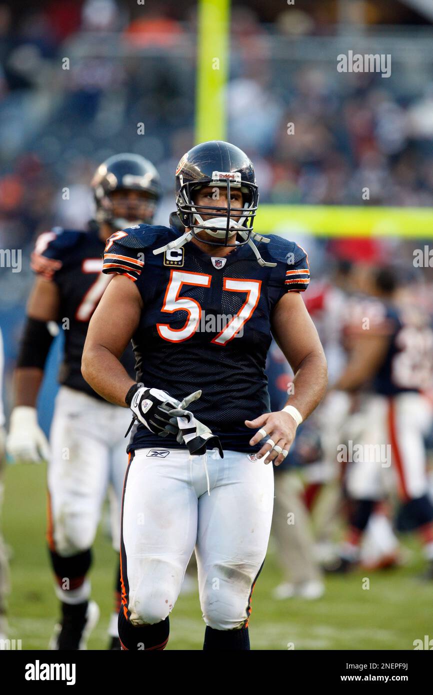 Chicago Bears center Olin Kreutz (57) leaves the field after the Bears' 41-21  loss to
