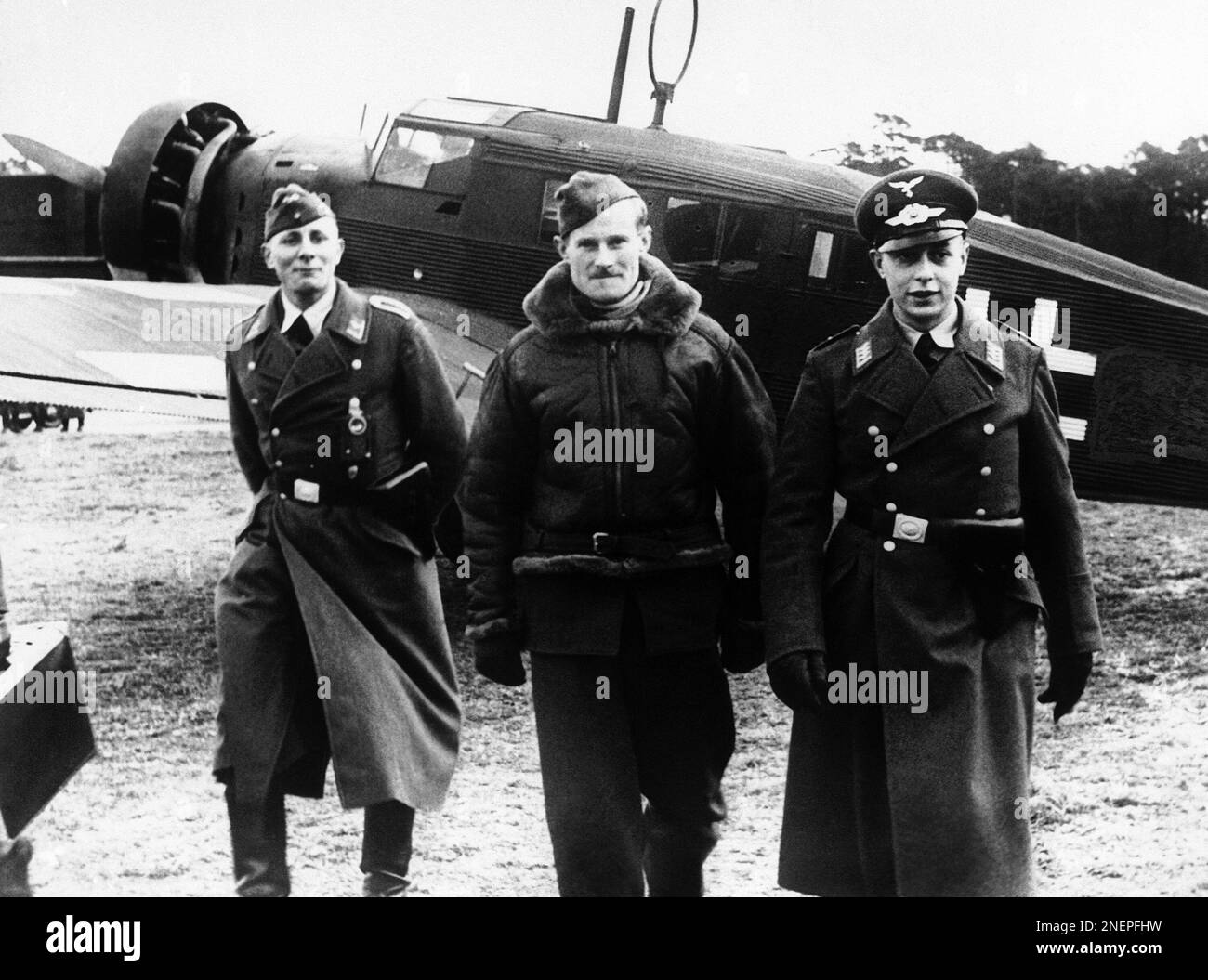 Royal Air Force Sergeant H. Rouse, center, in an undated photo