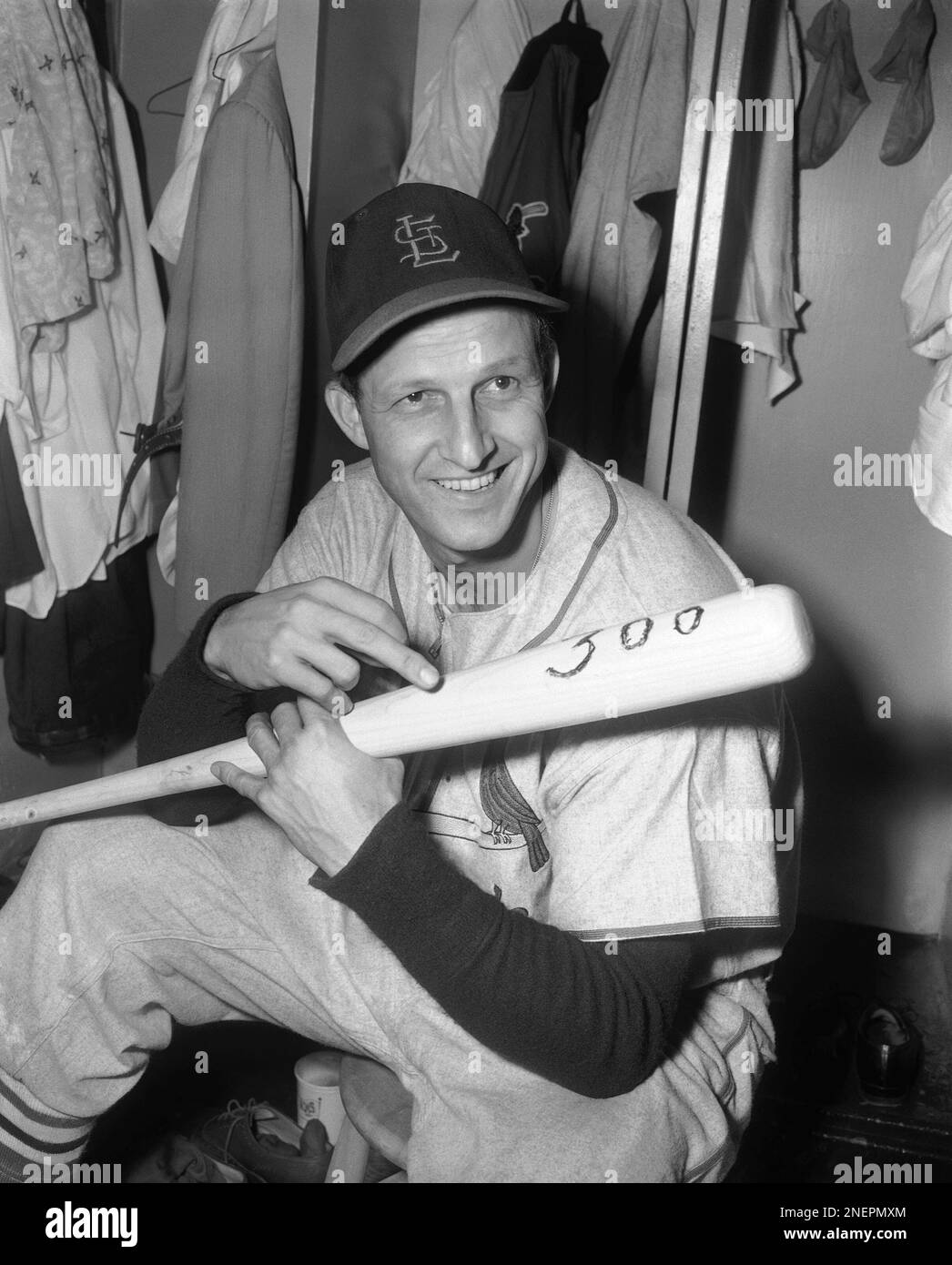 Stan ?The Man? Musial of the St. Louis Cardinals holds bat with 