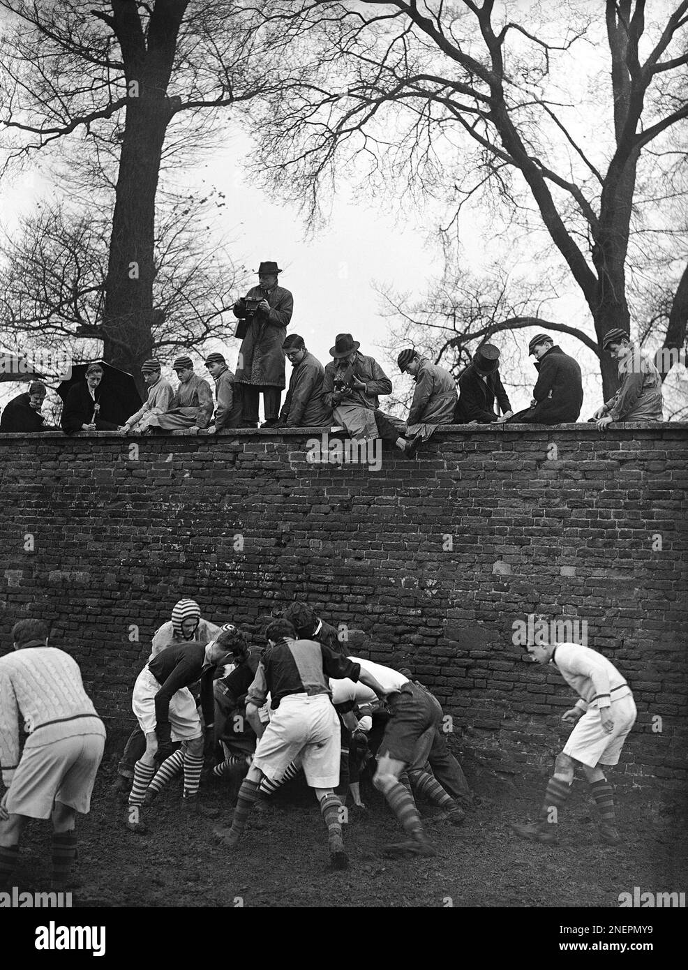 Eton boys watch the traditional Wall Game from the top of the famous ...