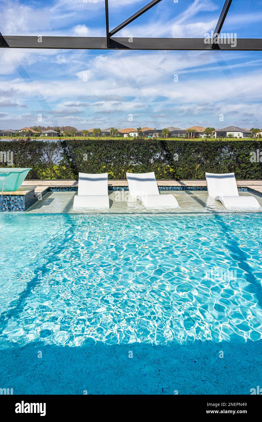 Home villa with screened in glass lanai private pool modern