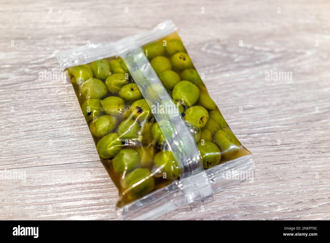 Castelvetrano Sicilian green olives in brine product packaging closeup with sweet variety of