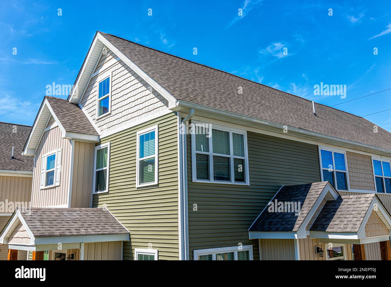 View of Construction building new modern apartment house with green painted ...
