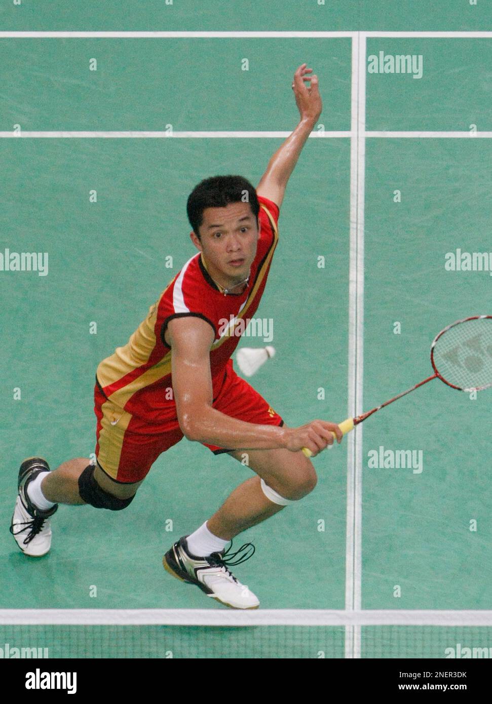 Indonesia's Taufik Hidayat in action against Dan Lin of China, unseen, during the final match at the France Open Team Badminton Championships in Paris, Sunday, Nov. 1, 2009. Dan Lin won the match. (AP Photo/Jacques Brinon) Stock Photo